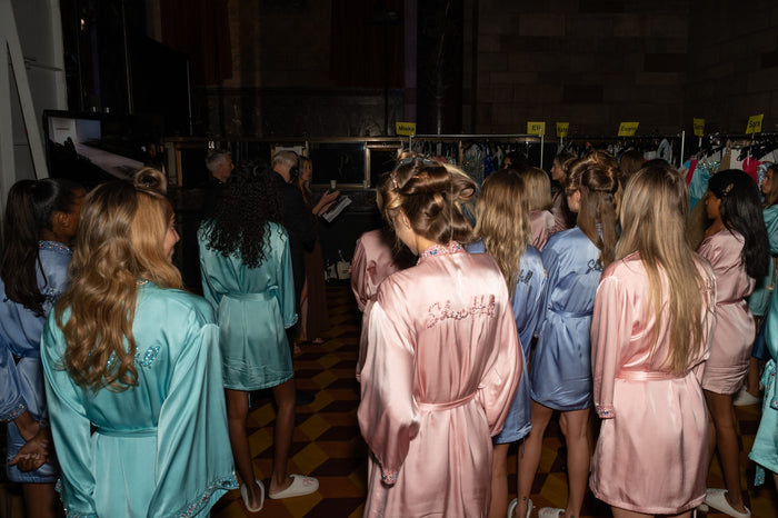 Models getting ready backstage before the Sherri Hill Spring 2027 show